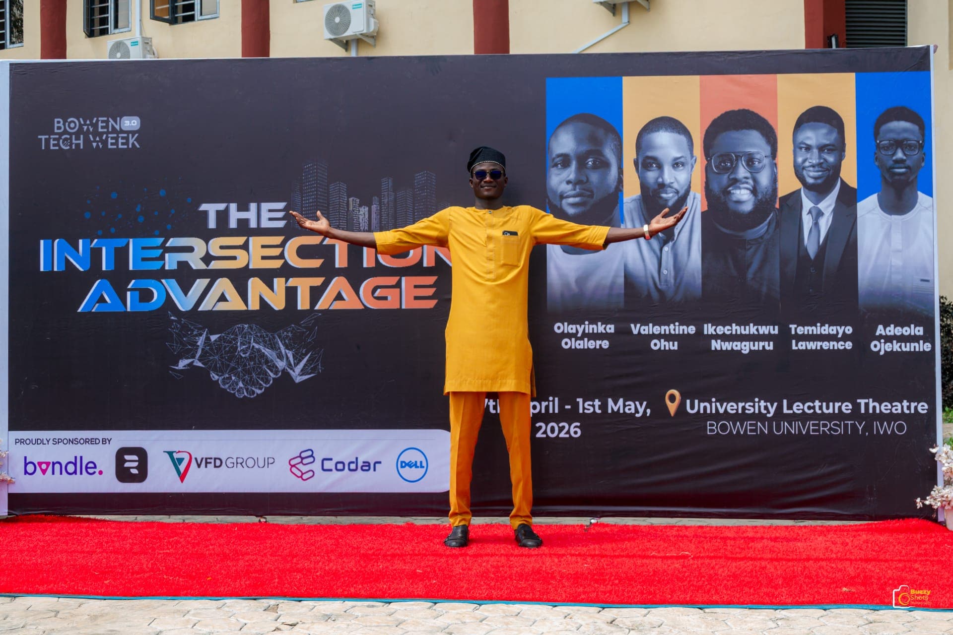Abdul-Salam on the red carpet in front of the Bowen Tech Week 3.0 'The Intersection Advantage' backdrop